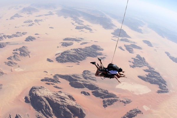 Sean Ogle skydiving over Wadi Rum, Jordan